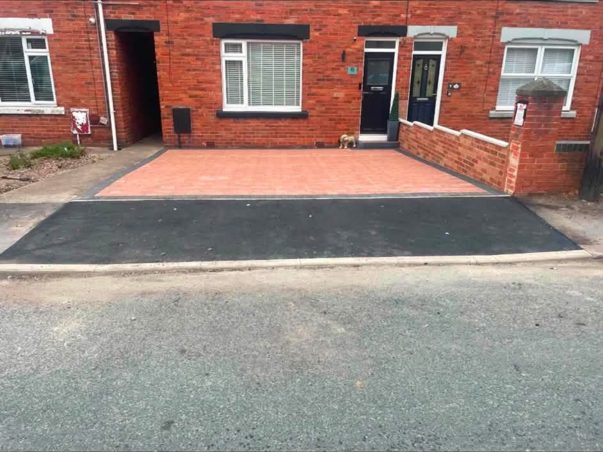 Drop kerb and block paved driveway
